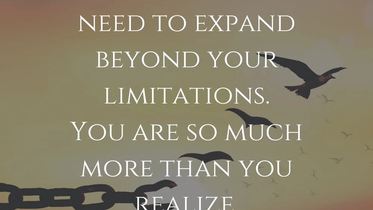 blue bowl of black bean beef tortilla soup on a board with cilantro and shredded cheese in background