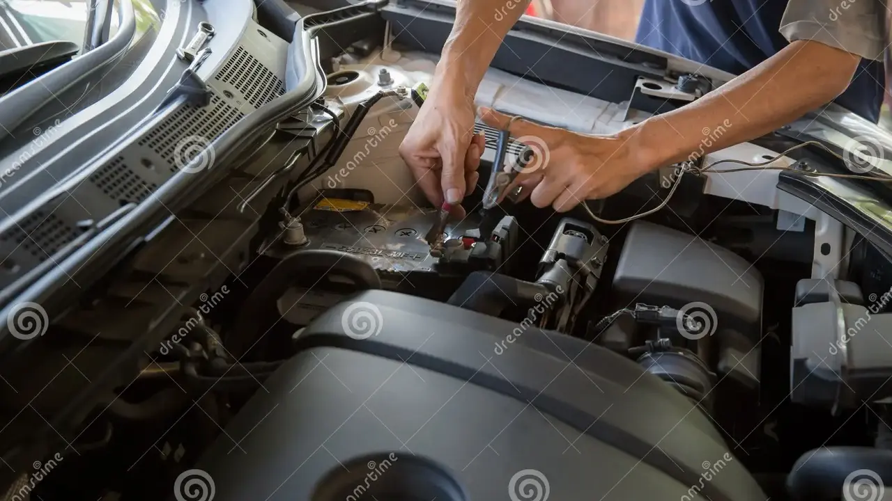 Close up on a plate of mashed potatoes, topped with baked pork chops with cream of mushroom soup, and a side of green beans.